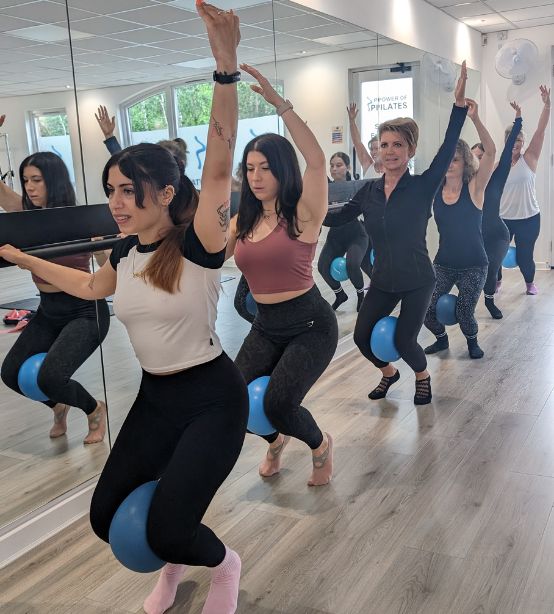 Barre & Mat Pilates with equipment at Power of Pilates