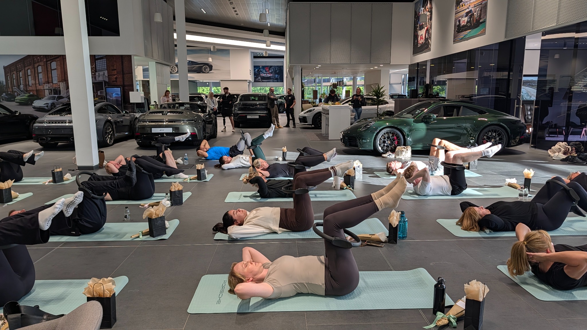 Pilates class inside Porsche Centre Reading